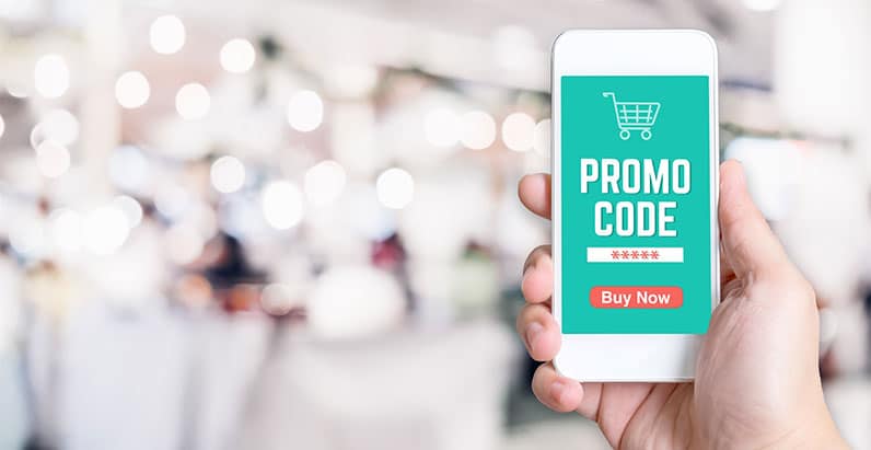 hand holding smartphone promo code