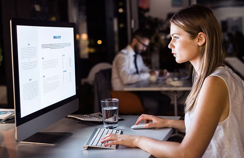 woman working office computer