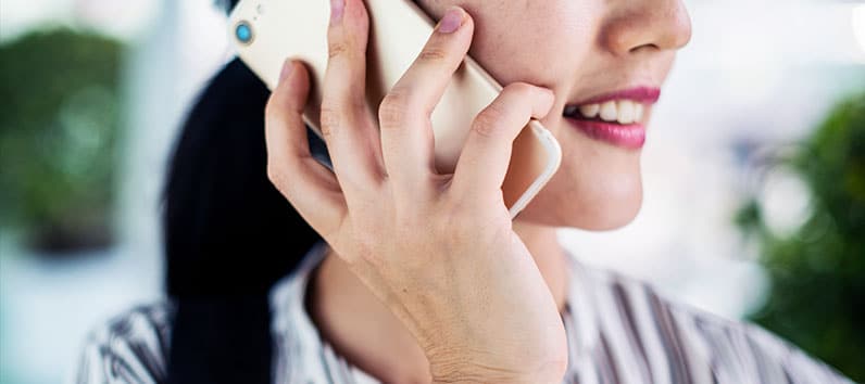 asian woman making a call