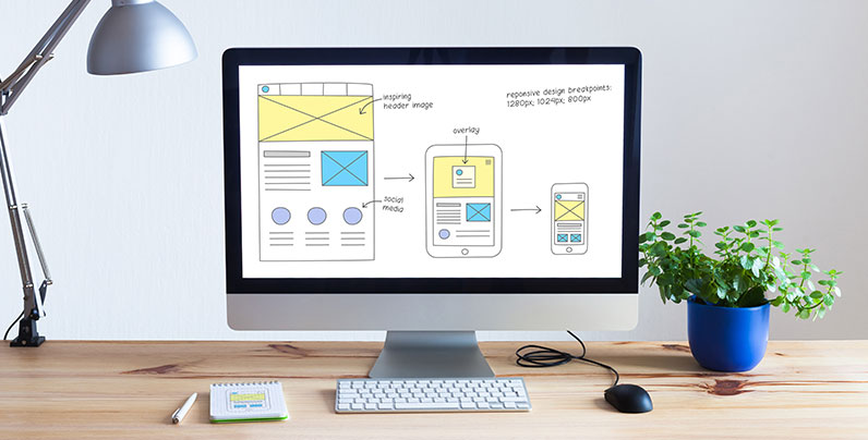 desktop computer designing responsive website