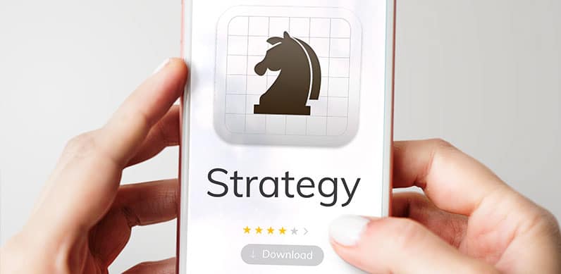 hands holding phone downloading app