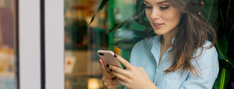 happy woman using phone