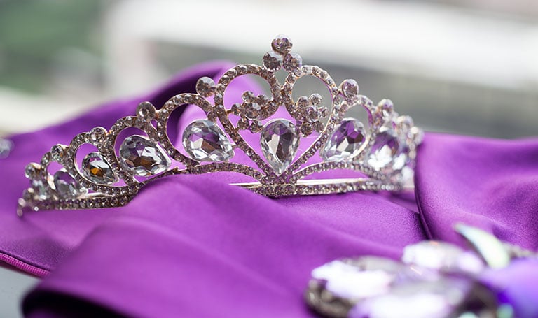 royal crown on a purple cloth