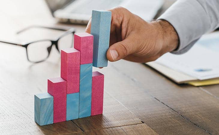 hand holding bar graph