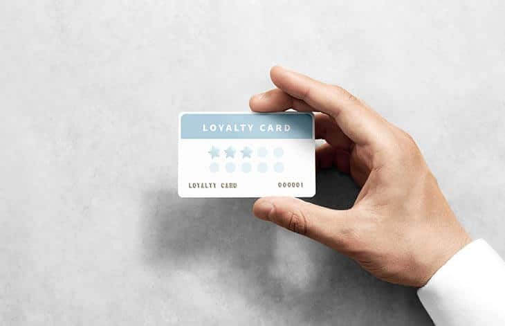 hand holding loyalty card