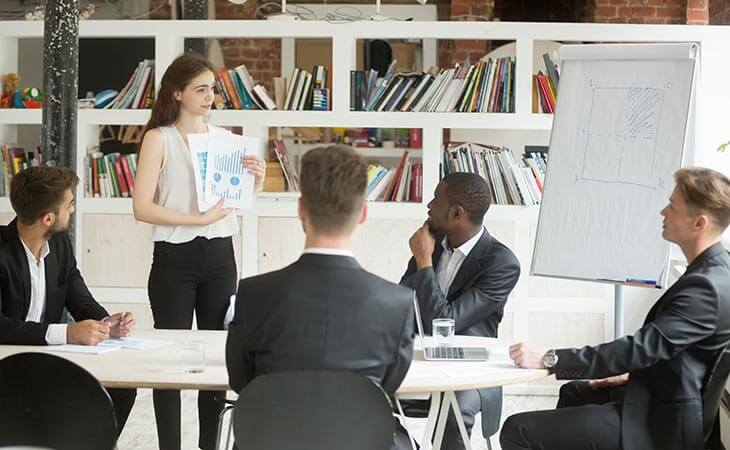 woman showing graphs meeting