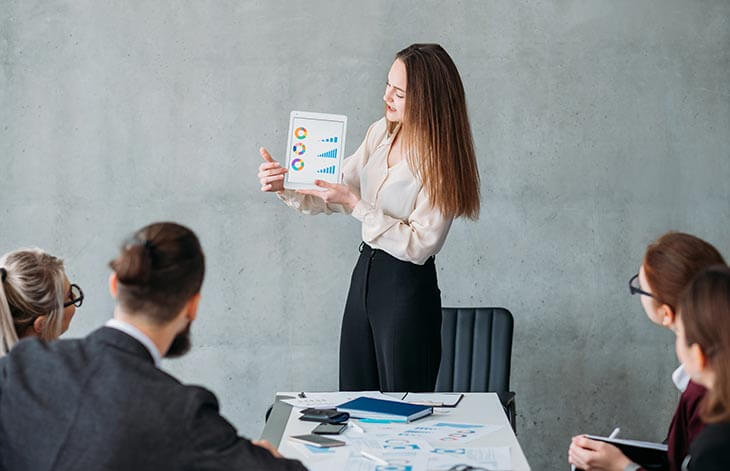 woman showing graphs