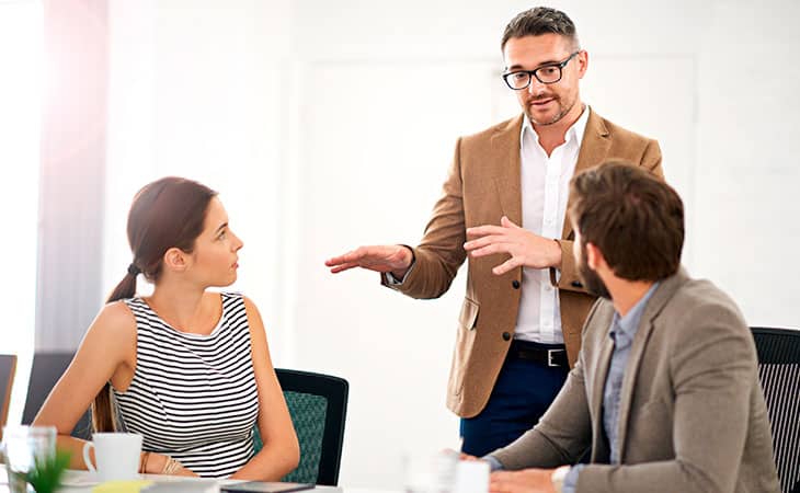 Importance Of Employer Branding: All You Need To Know Guide Evinex Corporation | Staffing Agency group of people debating