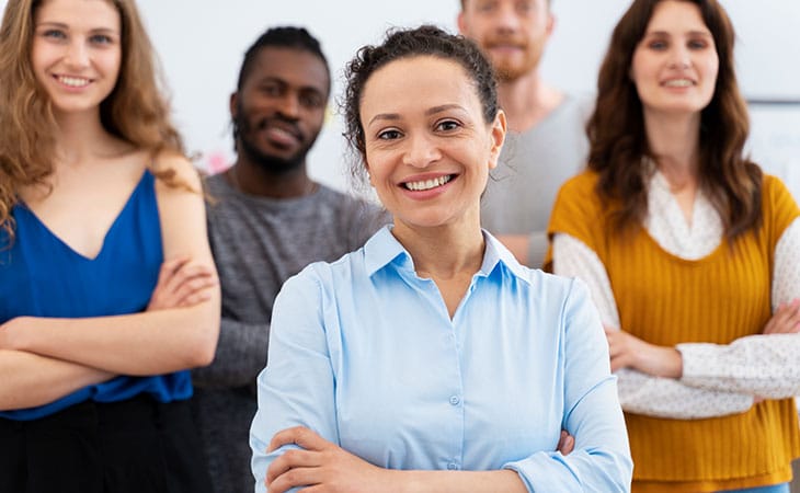 Job Descriptions For Executives (With Template &Amp; Examples) Evinex Corporation | Staffing Agency people smiling at workplace