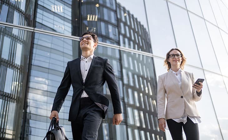 Job Descriptions For Executives (With Template &Amp; Examples) Evinex Corporation | Staffing Agency two coworkers