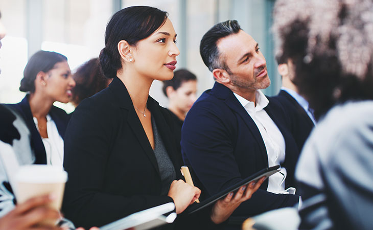 Program Manager Job Description: Essential Skills Guide Evinex Corporation | Staffing Agency attendees-watching-listening-interest