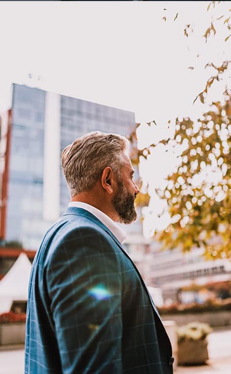 100+ Interview Questions For Executives With Sample Answers Evinex Corporation | Staffing Agency businessman in the street