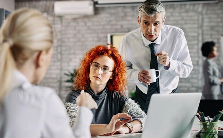 100+ Interview Questions For Executives With Sample Answers Evinex Corporation | Staffing Agency group of people working and having coffee