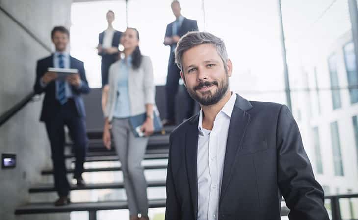 100+ Interview Questions For Executives With Sample Answers Evinex Corporation | Staffing Agency happy coworkers