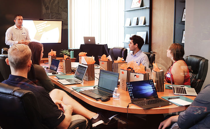 man-speech-office-workers-meeting