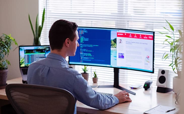 100+ Interview Questions For Executives With Sample Answers Evinex Corporation | Staffing Agency man working with his computer