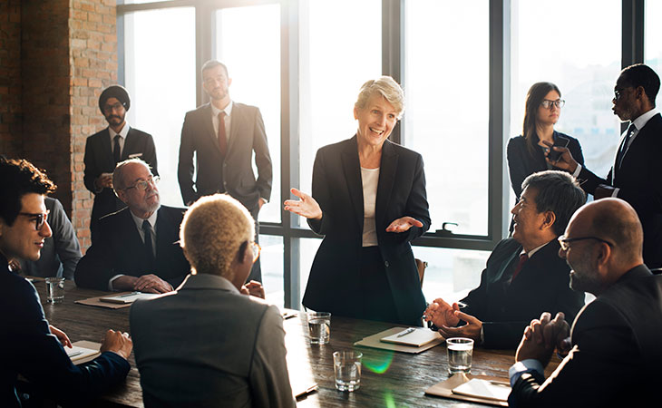 Program Manager Job Description: Essential Skills Guide Evinex Corporation | Staffing Agency office-full-people-woman-speech
