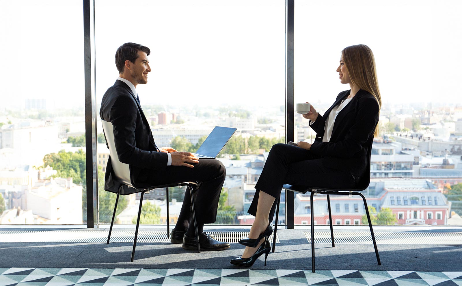 business-people-talking-window