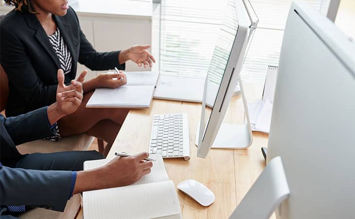 Engineer Job Description: How To, Tips, Templates &Amp; Examples Evinex Corporation | Staffing Agency detail-women-discussing-computers