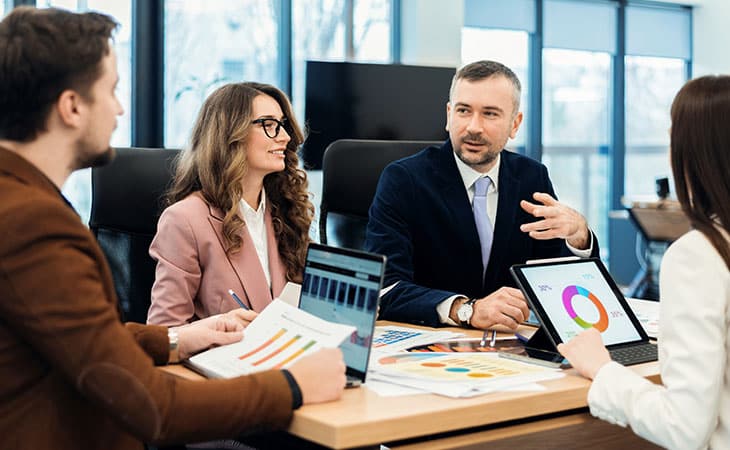 100+ Director Interview Questions - What To Ask + Answers Evinex Corporation | Staffing Agency group-people-meeting