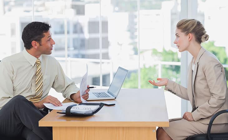 100+ Director Interview Questions - What To Ask + Answers Evinex Corporation | Staffing Agency man-woman-talking-job-interview