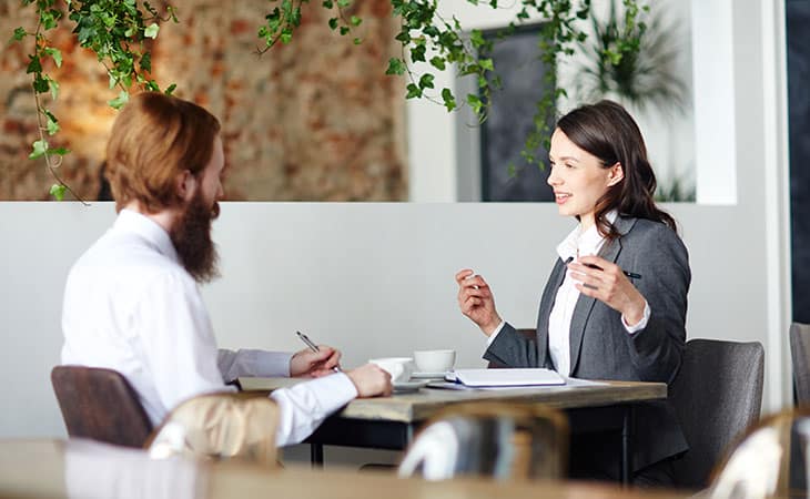 100+ Director Interview Questions - What To Ask + Answers Evinex Corporation | Staffing Agency two-women-talking-interview-office