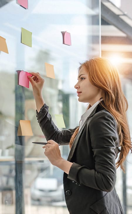 100+ Director Interview Questions - What To Ask + Answers Evinex Corporation | Staffing Agency woman-posit-its-glass