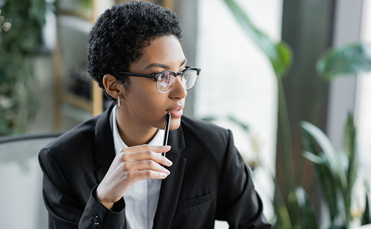 100+ Interview Questions For Product Managers + Answers Evinex Corporation | Staffing Agency woman-thinking-pen-mouth