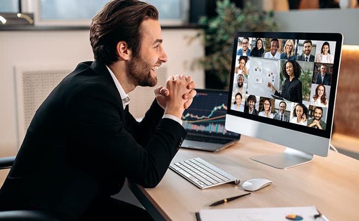 100+ Program Manager Interview Questions To Find Top Talent Evinex Corporation | Staffing Agency executive-man-videocall-computer