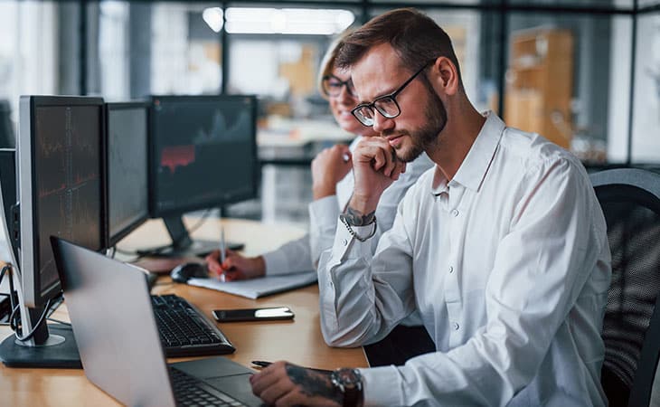 100+ Program Manager Interview Questions To Find Top Talent Evinex Corporation | Staffing Agency man-thinking-computer-office