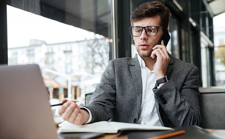 100+ Program Manager Interview Questions To Find Top Talent Evinex Corporation | Staffing Agency man-working-laptop-phone