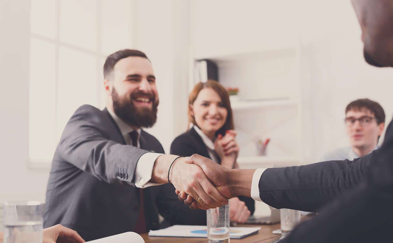 happy-people-handshake