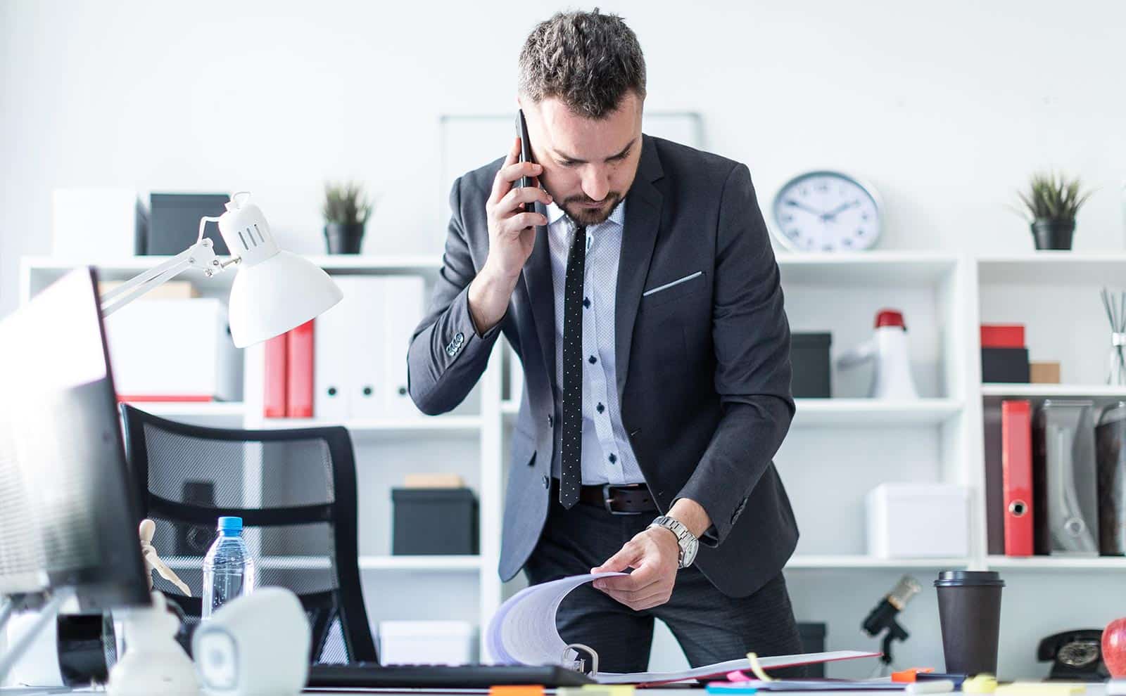 busy-businessman-talking-phone