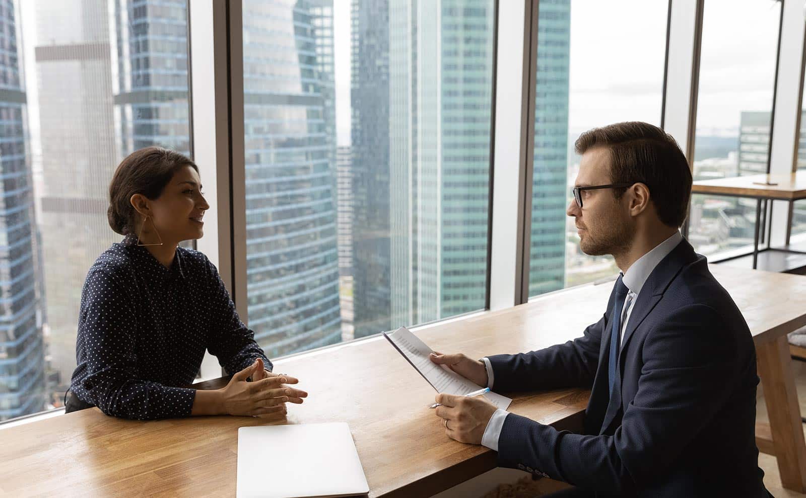 man-woman-talking-job-interview