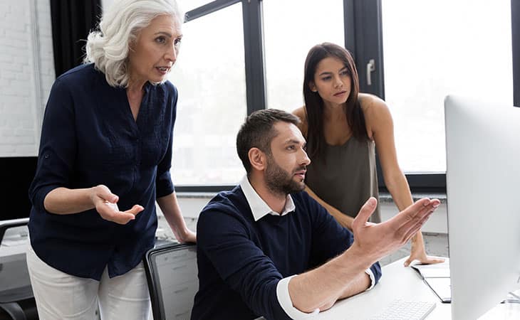 100+ Interview Questions To Identify Top Product Owners Evinex Corporation | Staffing Agency people-talking-watching-computer-screen