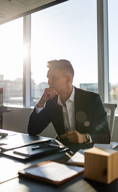 Mastering Interpersonal Skills: Your Guide To Success Evinex Corporation | Staffing Agency a thoughtful businessman in an office