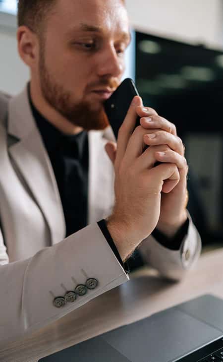 100+ Essential Business Analyst Interview Questions Evinex Corporation | Staffing Agency man-thinking-looking-laptop-phone