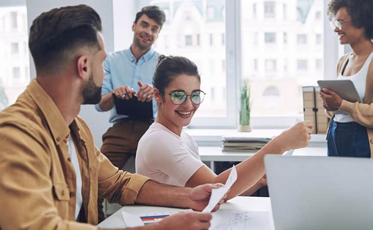 What Is Workforce Management? Key Benefits Evinex Corporation | Staffing Agency happy and diverse office workers
