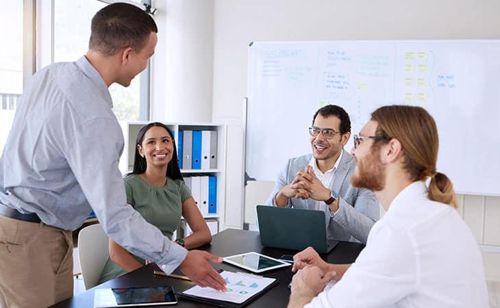 100+ Interview Questions For The Perfect Executive Assistant Evinex Corporation | Staffing Agency office-people-smiling-meeting