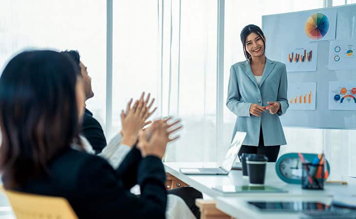 100+ Interview Questions For The Perfect Executive Assistant Evinex Corporation | Staffing Agency people-applause-woman-presentation