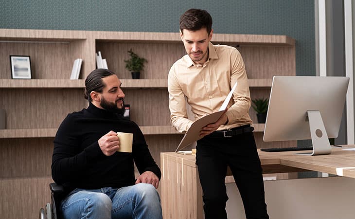 100+ Interview Questions For The Perfect Executive Assistant Evinex Corporation | Staffing Agency two-men-talking-papers