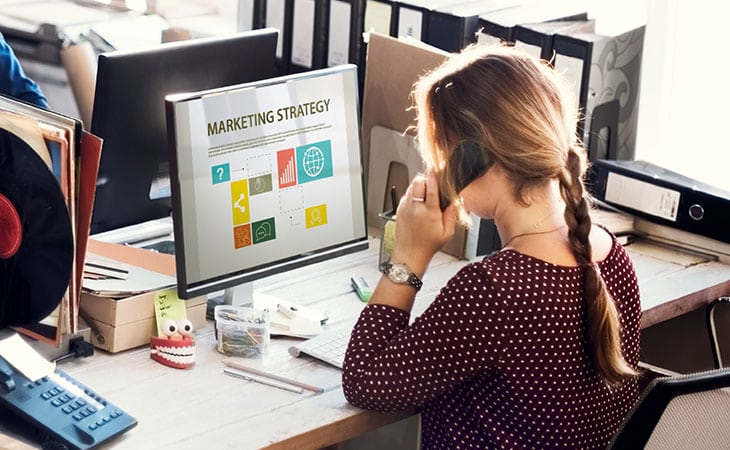 100+ Interview Questions For The Perfect Executive Assistant Evinex Corporation | Staffing Agency woman-phone-computer-marketing