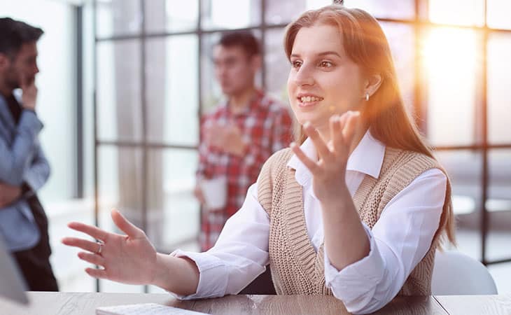 100+ Sales Manager Interview Questions With Answers Evinex Corporation | Staffing Agency a smiling woman making gestures while talking