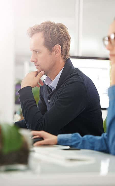 What Is A Chief Of Staff? Key Responsibilities And More Evinex Corporation | Staffing Agency a thoughtful man with his hand in his chin in the office
