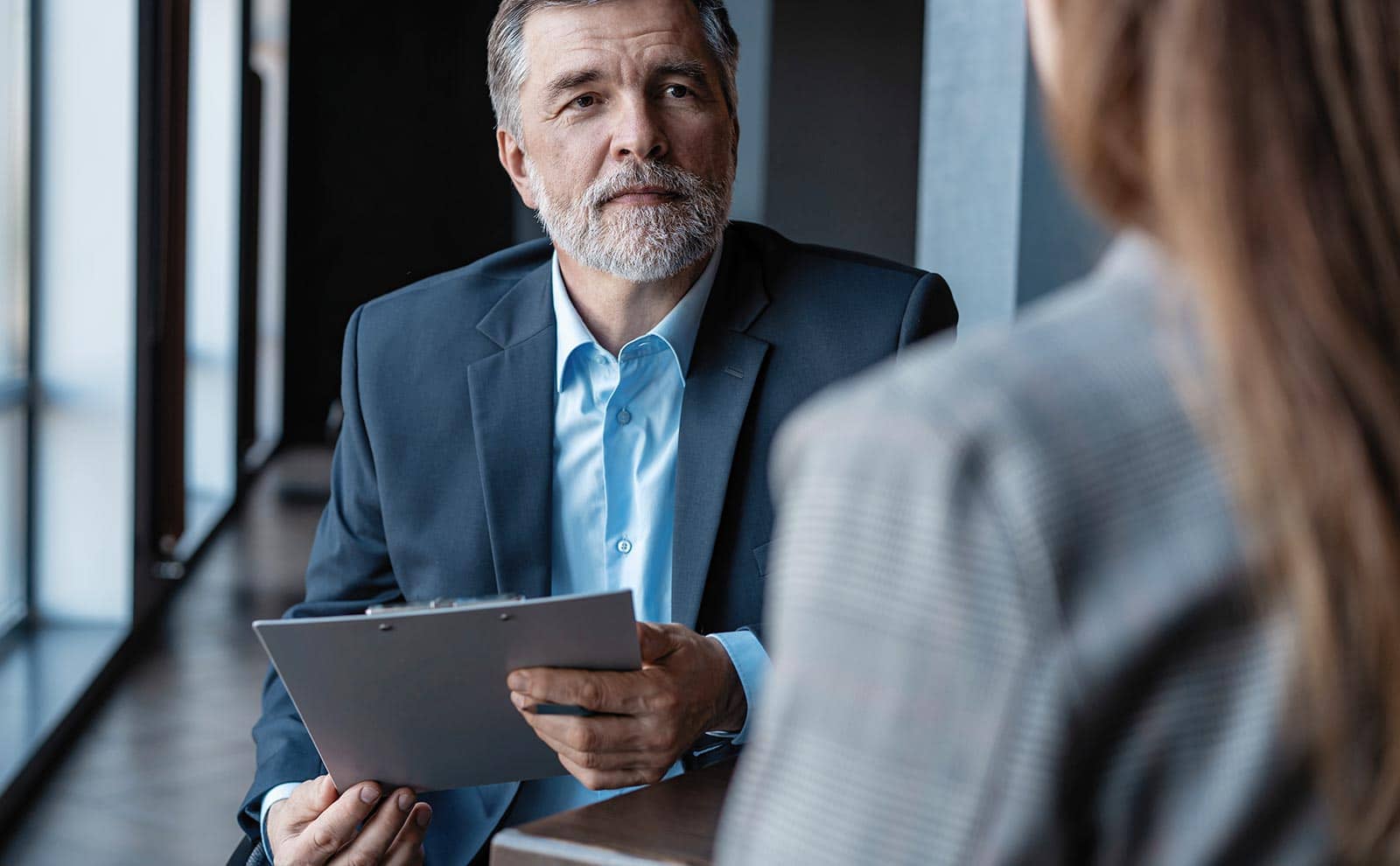a businessman looking at woman