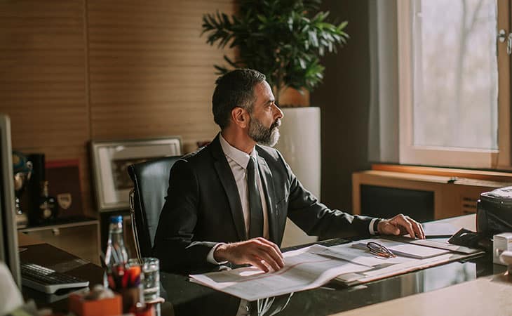 100+ Chief Of Staff Interview Questions. Find Top Leaders Evinex Corporation | Staffing Agency a man working at his office