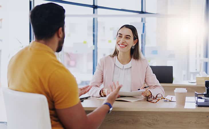 100+ Chief Of Staff Interview Questions. Find Top Leaders Evinex Corporation | Staffing Agency a woman and a man talking in the office