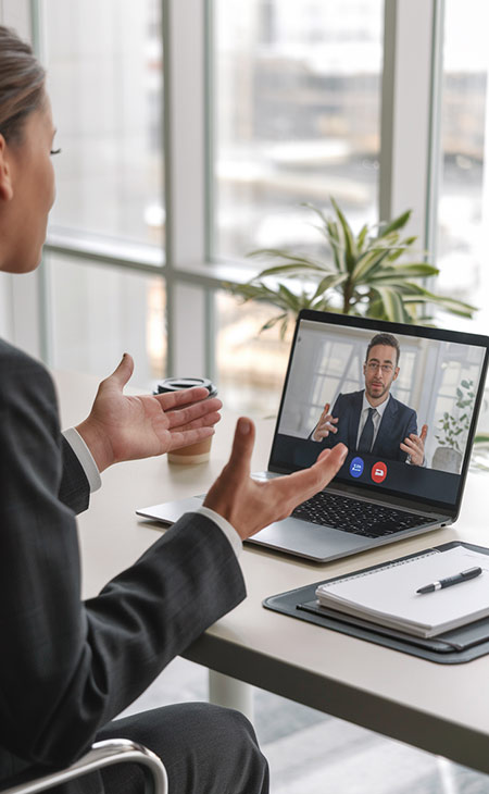 Interview Cheat Sheet: Essential Tips To Ace Your Interview Evinex Corporation | Staffing Agency a video call during a job interview